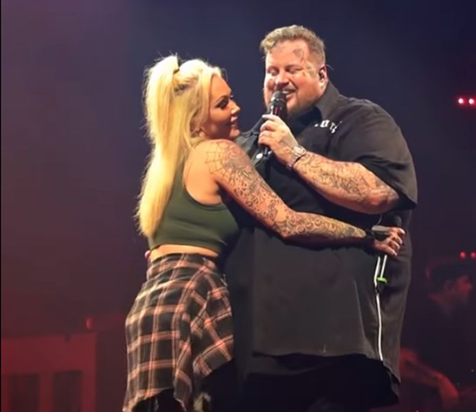 Jelly Roll with wife Bunnie Xo on stage